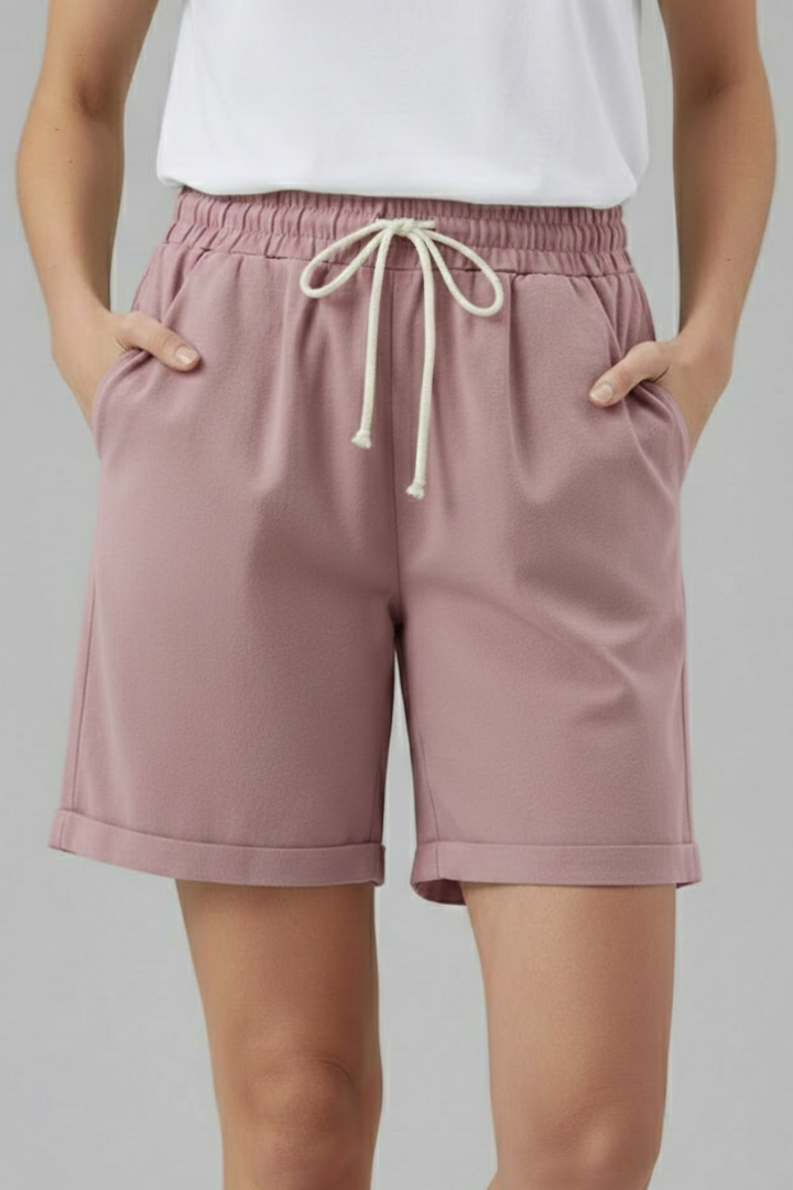 Comfortable women's everyday shorts, featuring a drawstring waist & trendy cuffs.