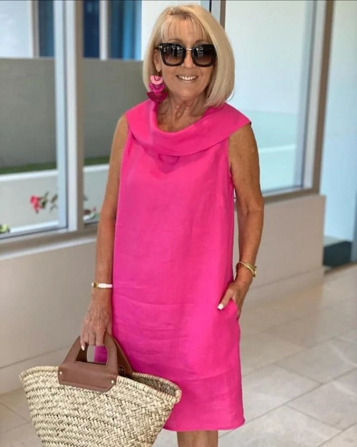 Women's casual sleeveless cowl neck shift dress with pockets, perfect for summer vacation or everyday style.