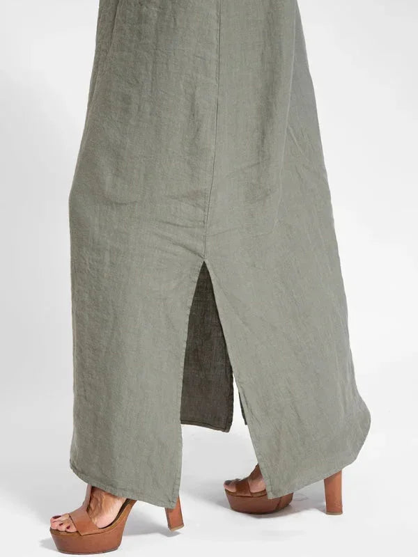 Versatile sleeveless maxi dress for women, featuring a side slit for movement, great for day to night.