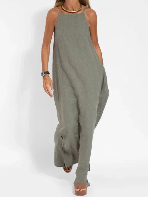 Stylish women's side slit maxi dress, a relaxed fit sleeveless design for versatile summer fashion.