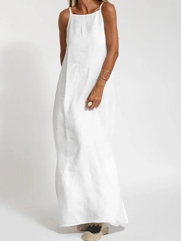 Solid color women's sleeveless maxi dress with a flattering side slit, excellent for vacation & beach.