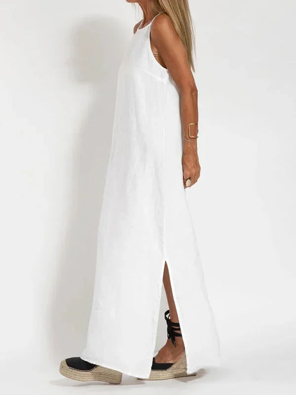 Relaxed fit sleeveless casual dress for women, featuring a flowy design & practical side slit detail.