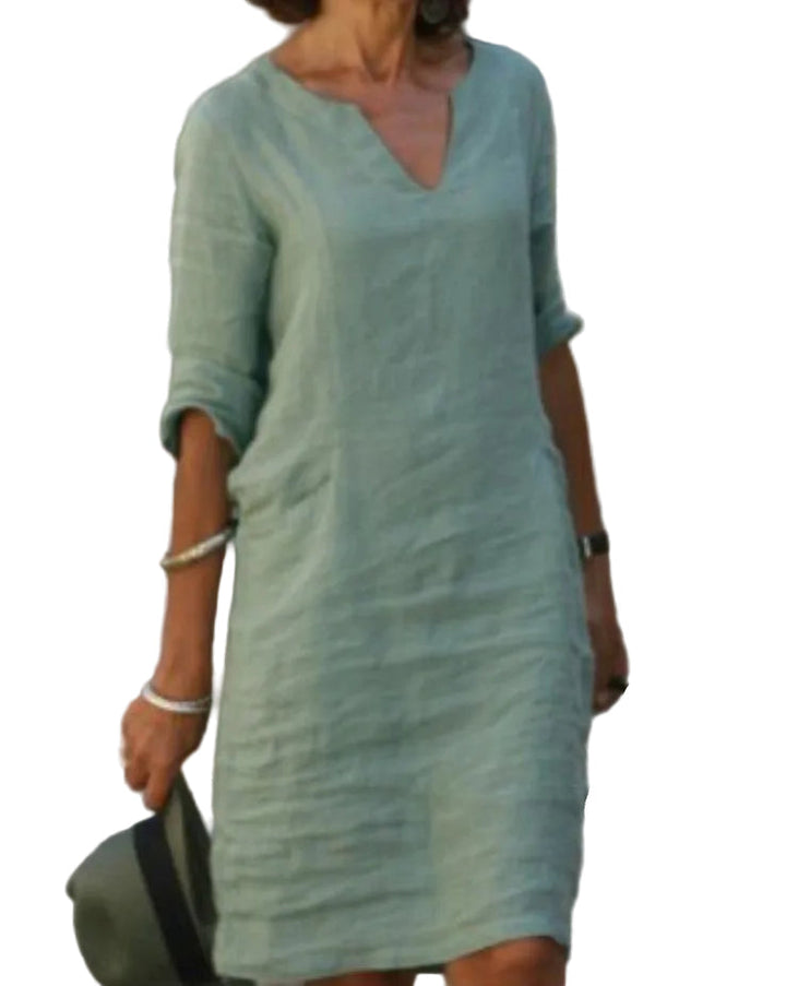 Women's casual V-neck midi dress with relaxed fit, perfect for summer everyday wear.