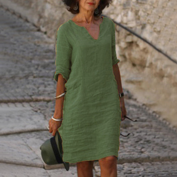 Comfortable women's relaxed fit V-neck midi dress, ideal for effortless spring and summer style.