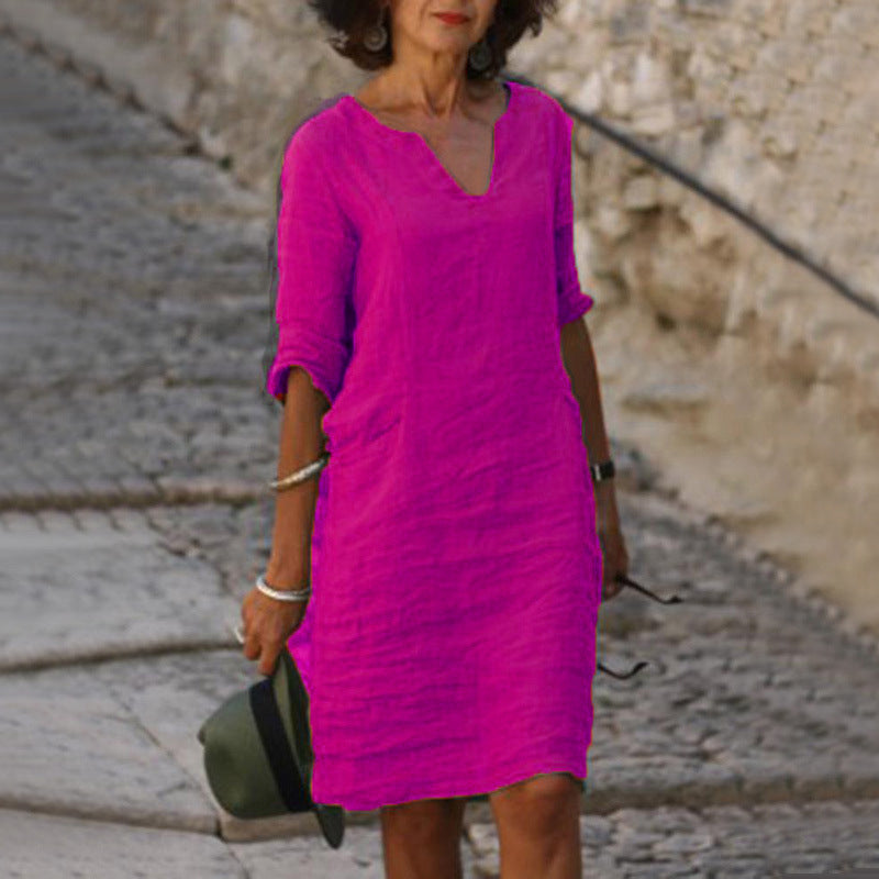 Versatile women's V-neck midi dress, a relaxed fit casual staple for vacation or daily wear.