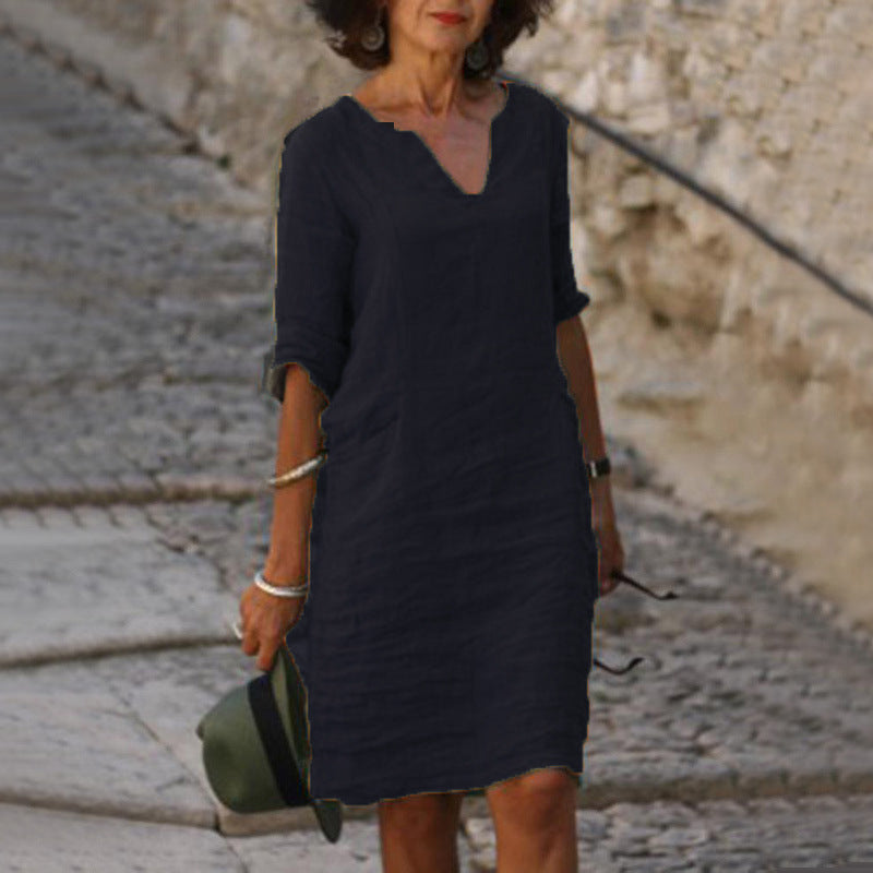 Relaxed fit women's casual midi dress with a flattering V-neck and stylish 3/4 sleeves.