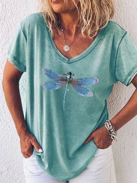 Stylish women's short sleeve V-neck tee with a vibrant dragonfly print, great for casual summer outfits.