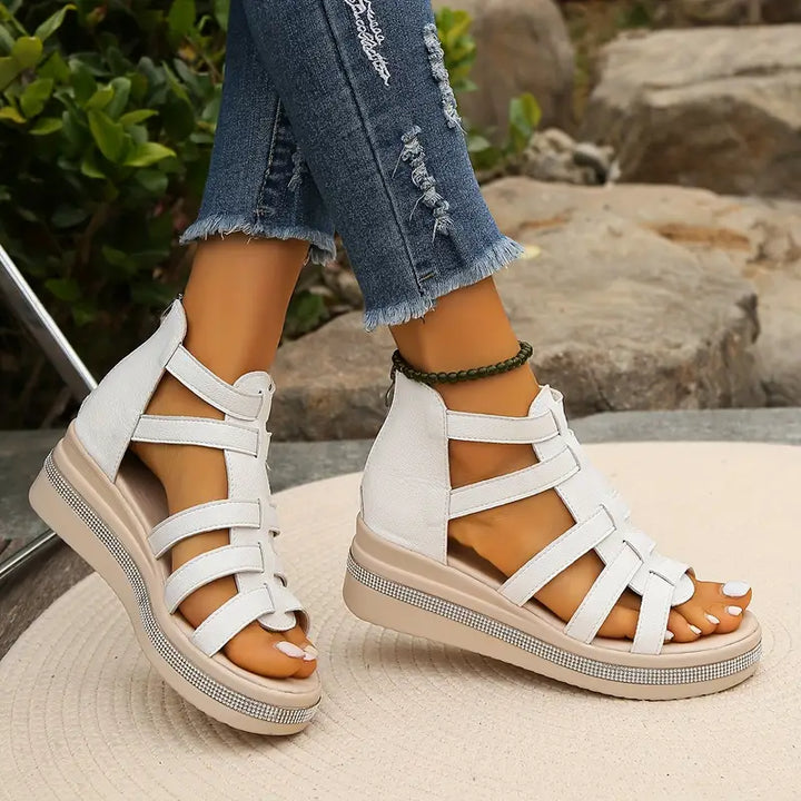 Elegant women's slip-on wedge sandals, casual open-toe style for summer ease.