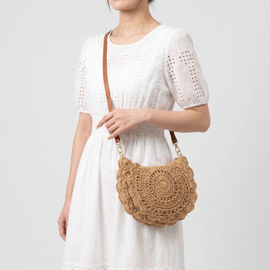 Versatile women's beige woven saddle bag, a stylish casual crossbody for everyday essentials. Textured & vintage.