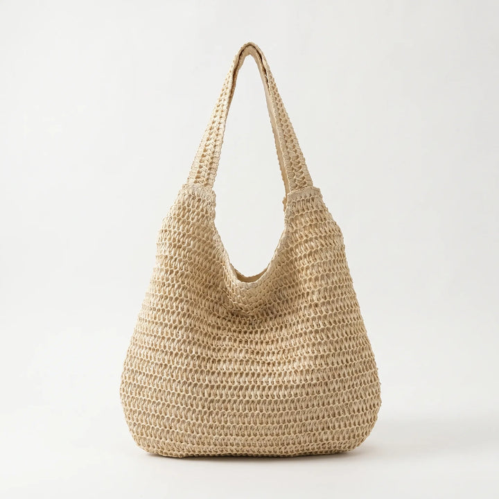 Spacious open-top women's woven tote bag, a versatile casual shoulder bag for summer outfits and accessories.