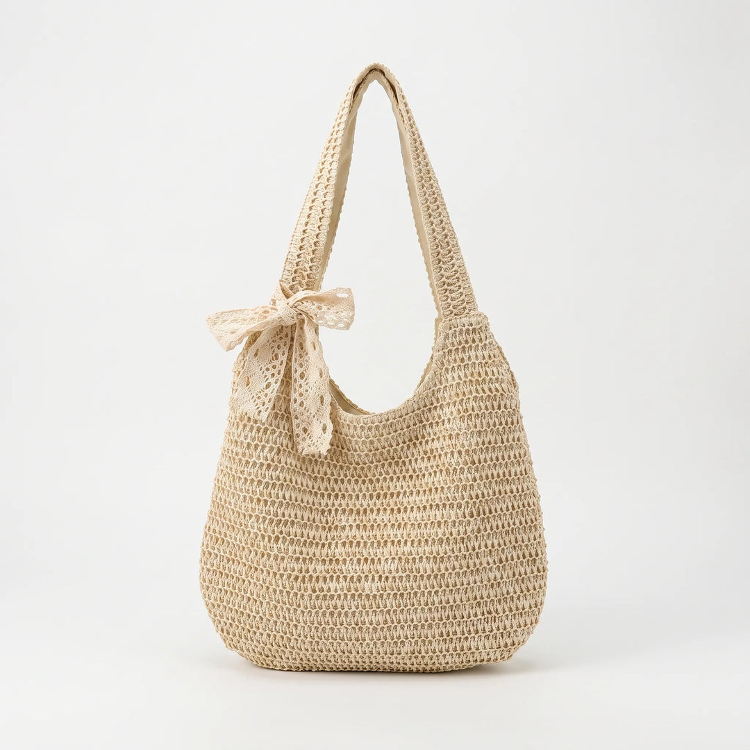 Chic women's woven shoulder tote, a comfortable and fashionable casual bag for summer adventures and daily style.