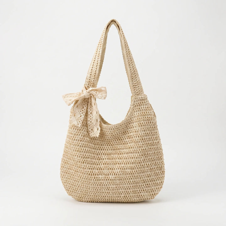 Chic women's woven shoulder tote, a comfortable and fashionable casual bag for summer adventures and daily style.