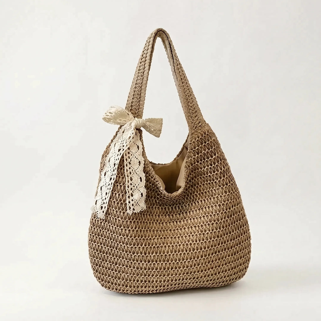 Stylish women's woven shoulder tote bag. Casual, open-top design, ideal for summer, travel, and everyday fashion.