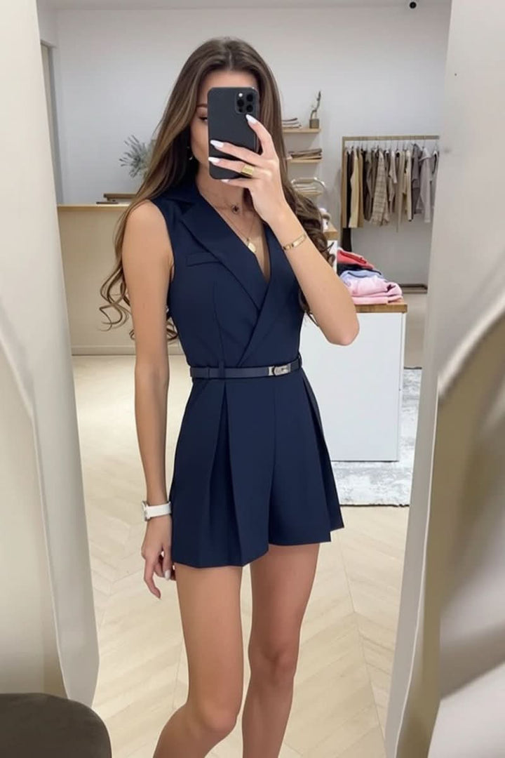 Stylish black women's sleeveless romper with belt. Chic casual summer one-piece for versatile fashion.