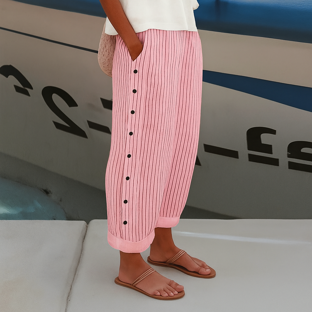 Versatile women's cropped pants with elegant stripe and button details, ideal for smart casual or everyday fashion.