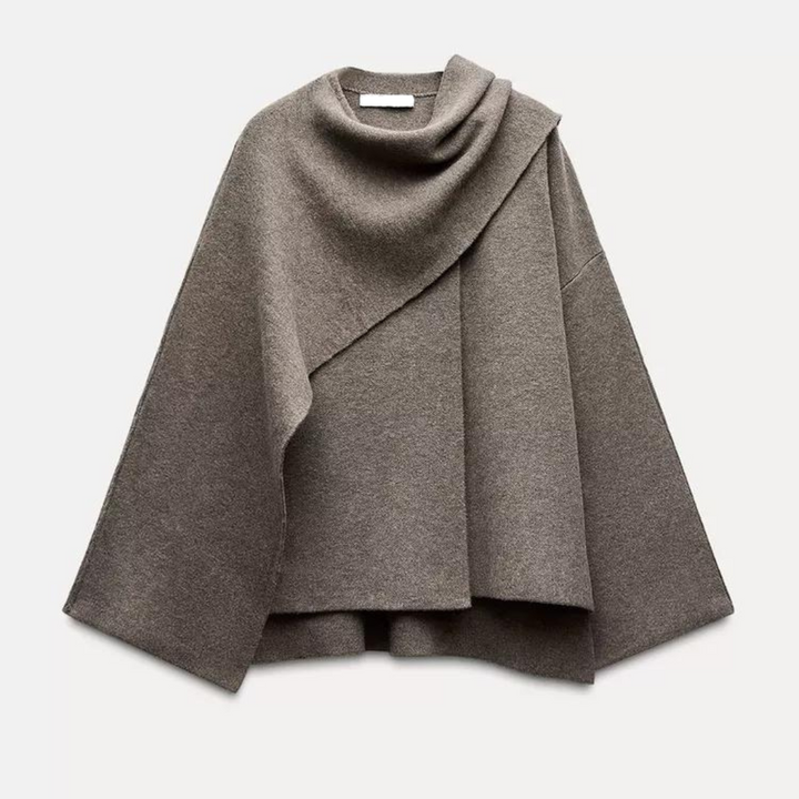 Effortless women's drape cape coat in a flattering loose fit. Chic and elegant transitional outerwear for any occasion.