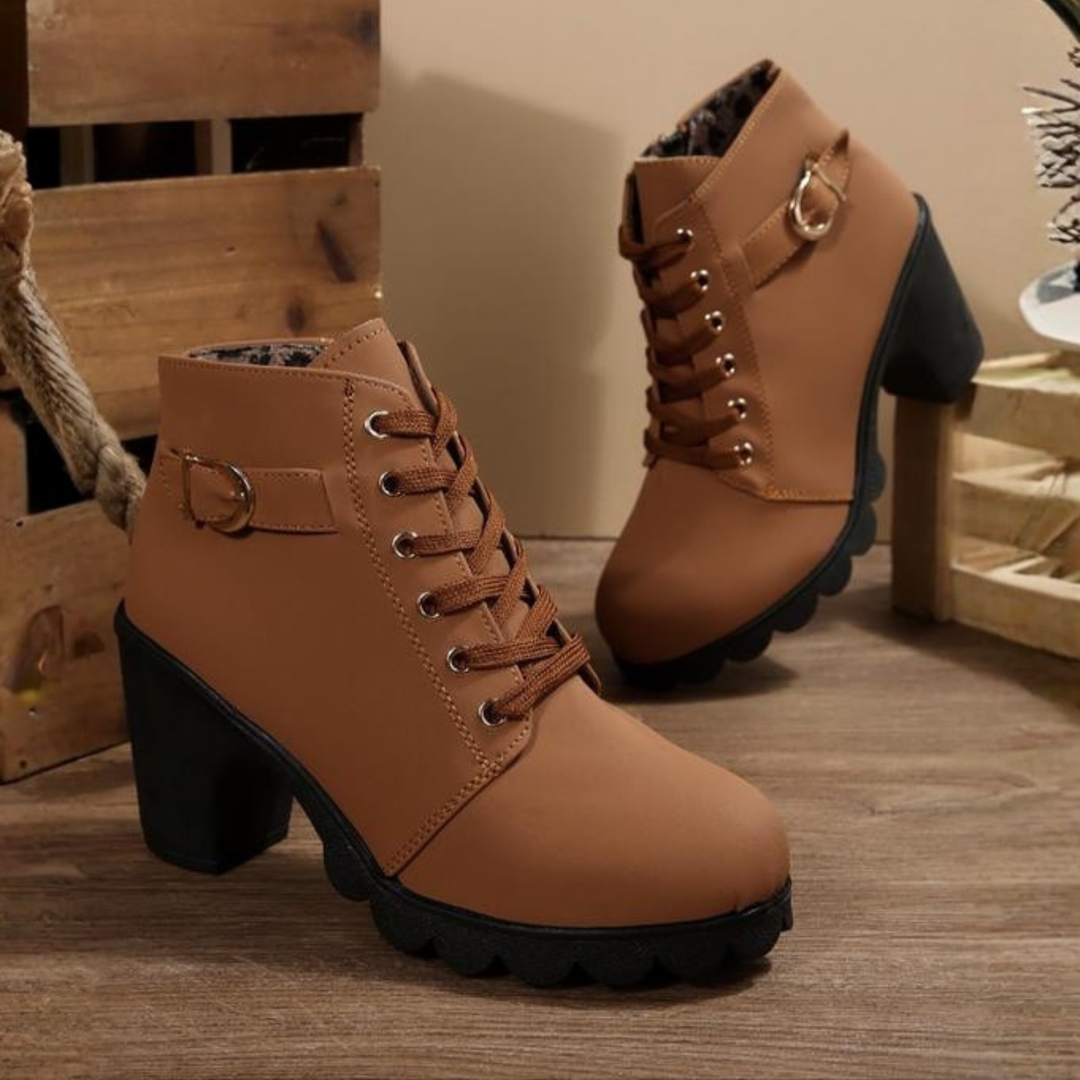 Stylish women's chunky lace-up ankle boots with a comfortable heel. Perfect for casual wear, autumn & winter fashion.