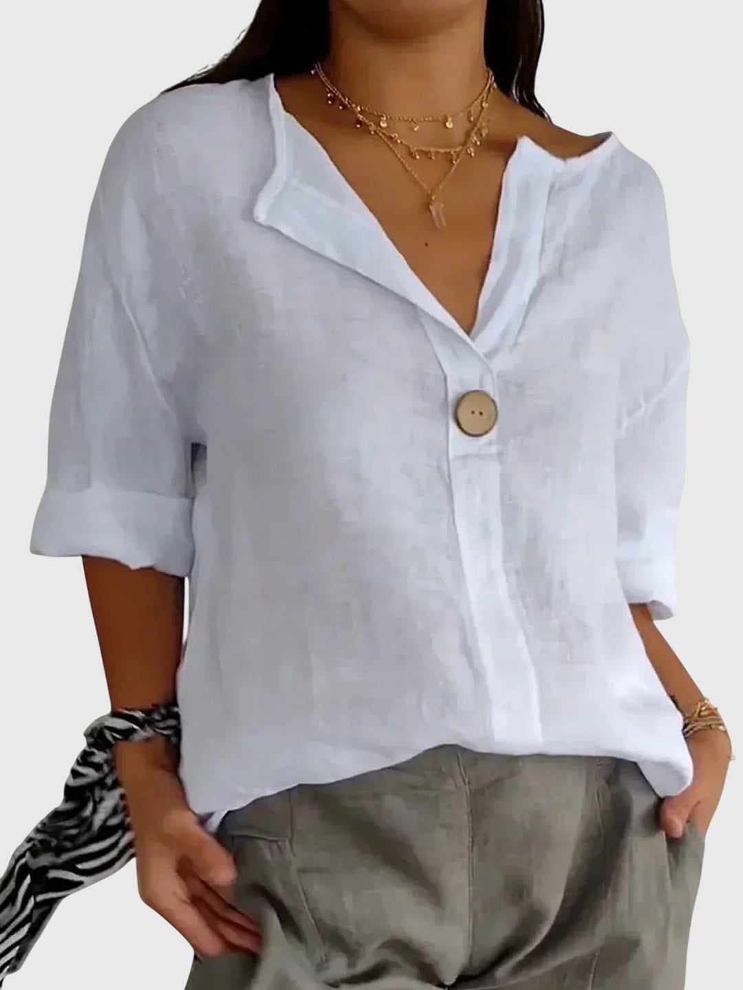 Comfortable women's blouse in soft fabric, a modern long sleeve top perfect for casual wear or office elegance.