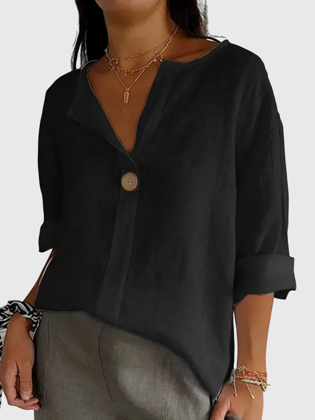 Stylish women's long sleeve blouse, a versatile top for office wear or elegant casual outfits. Modern flattering fit.