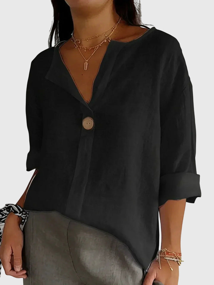 Stylish women's long sleeve blouse, a versatile top for office wear or elegant casual outfits. Modern flattering fit.
