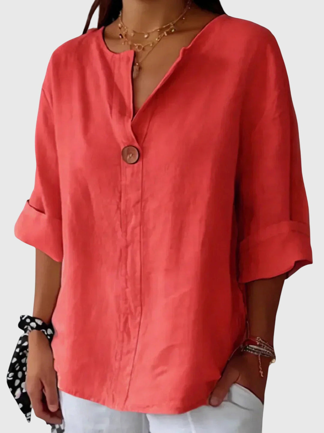 Elegant women's blouse with a flattering fit, a chic long sleeve top offering comfort for everyday and professional look.