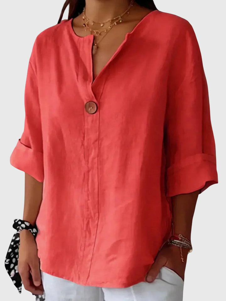 Elegant women's blouse with a flattering fit, a chic long sleeve top offering comfort for everyday and professional look.