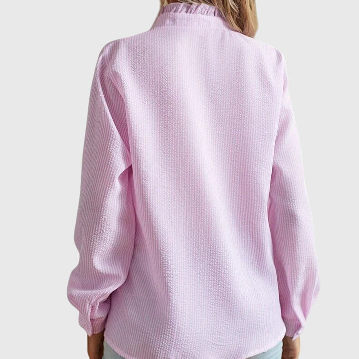 Elegant women's top, a chic long-sleeve blouse suitable for office wear and versatile casual styling.