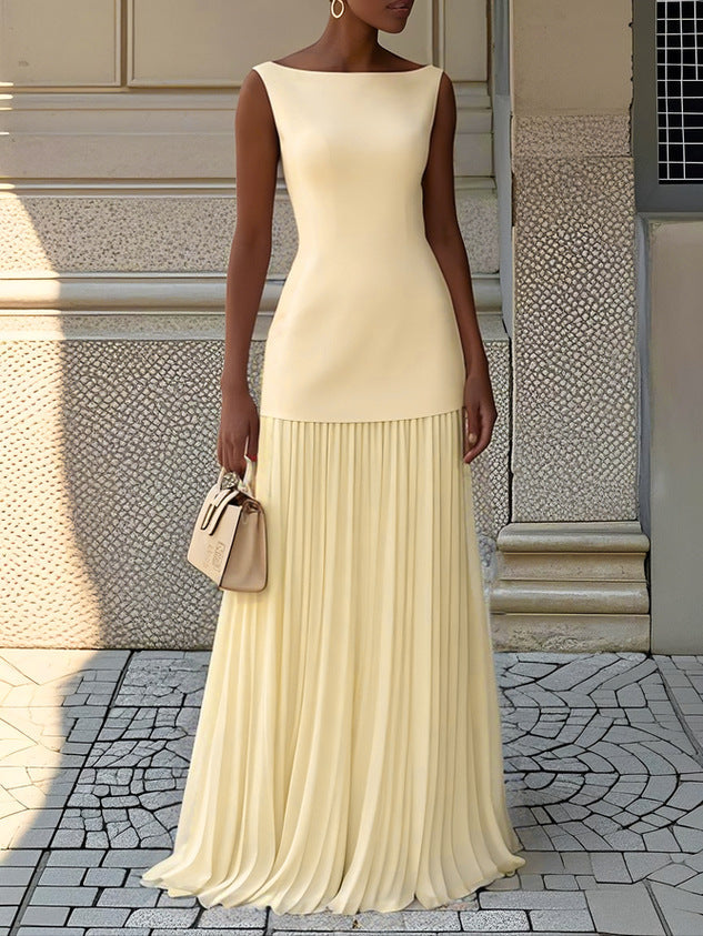 Sophisticated women's drop waist maxi dress for special occasions, elegant boat-neck and pleated design.