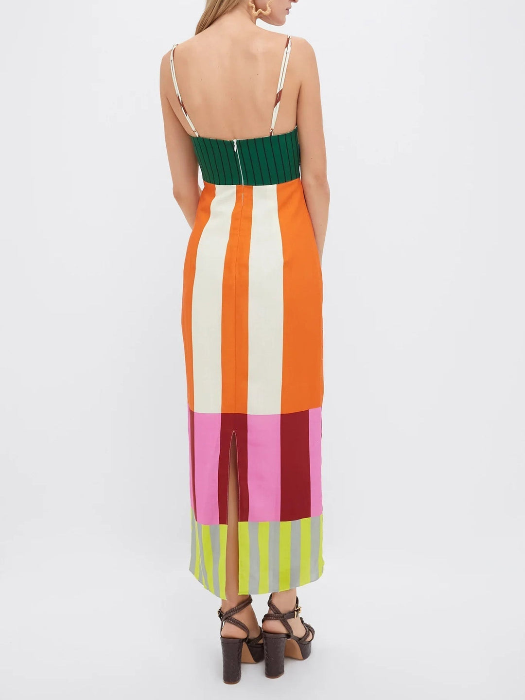 Fashionable women's stripe midi dress. Bodycon sleeveless design, versatile for summer style or evening wear.