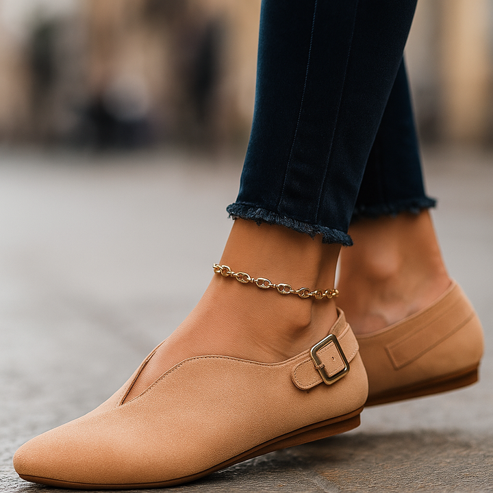Comfortable women's slip-on loafers featuring a chic buckle. Perfect daily wear flats for effortless style.