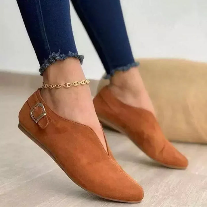 Fashionable women's buckle loafers. Comfortable slip-on flats for daily wear, office, or elegant casual style.