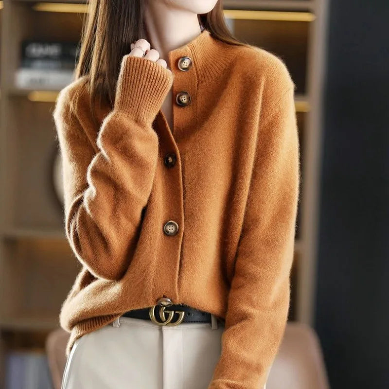 Beige women's relaxed fit button-front cardigan. Chic knitwear, a cozy and elegant layering piece.
