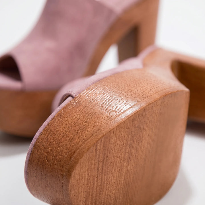 Comfortable slip-on platform mules with a trendy chunky sole and block heel.