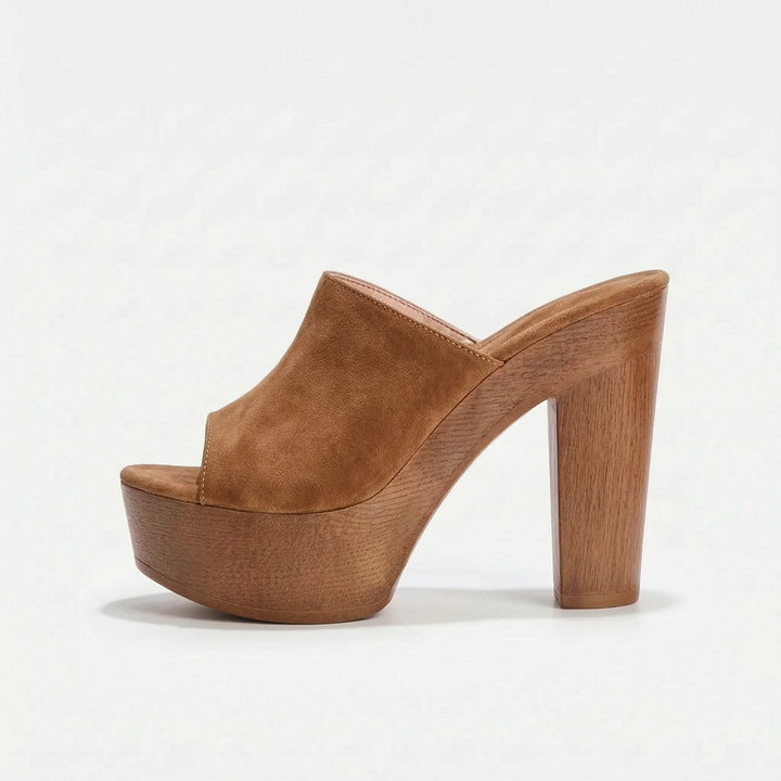 Trendy women's chunky platform sandals featuring a comfortable block heel and open toe.
