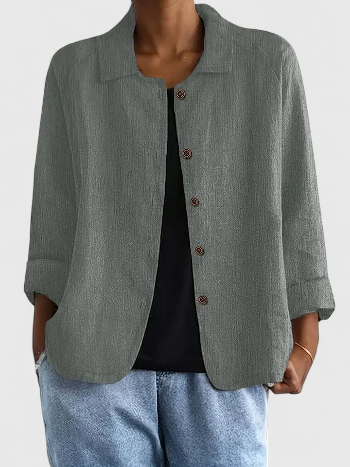 Classic women's versatile blouse, showing a comfortable and elegant fit from the back.