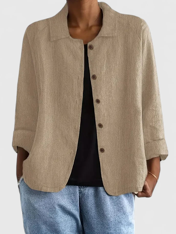 Stylish women's long-sleeve blouse, an everyday essential combining comfort with chic elegance.