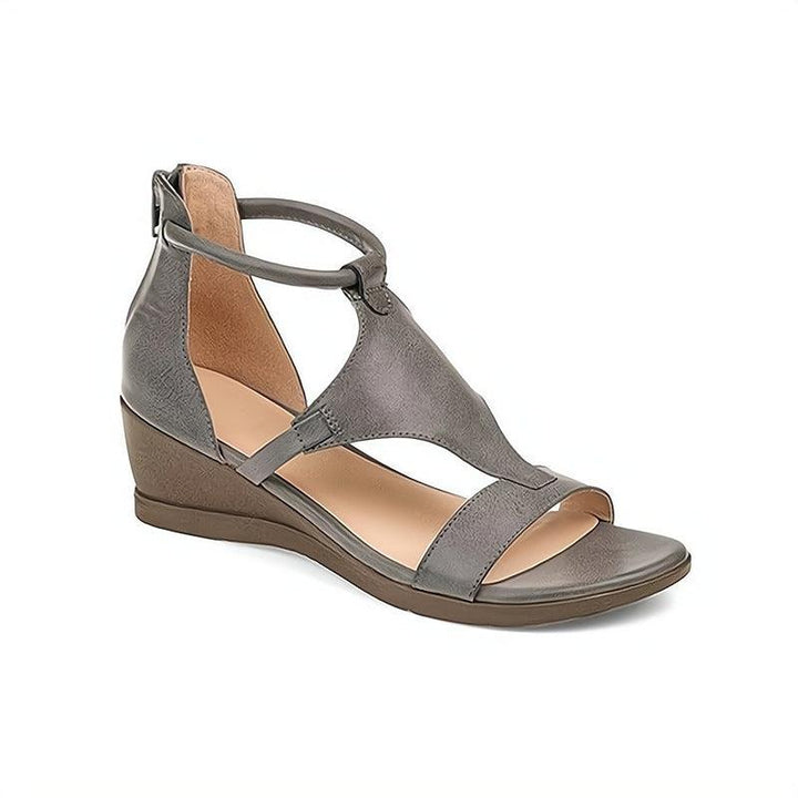 Chic women's flat sandals for everyday comfort and style. Perfect versatile summer footwear.