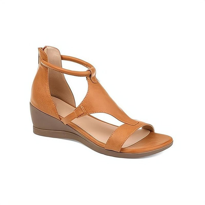 Women's comfortable flat sandals with a chic slip-on design. Essential everyday summer footwear for style.