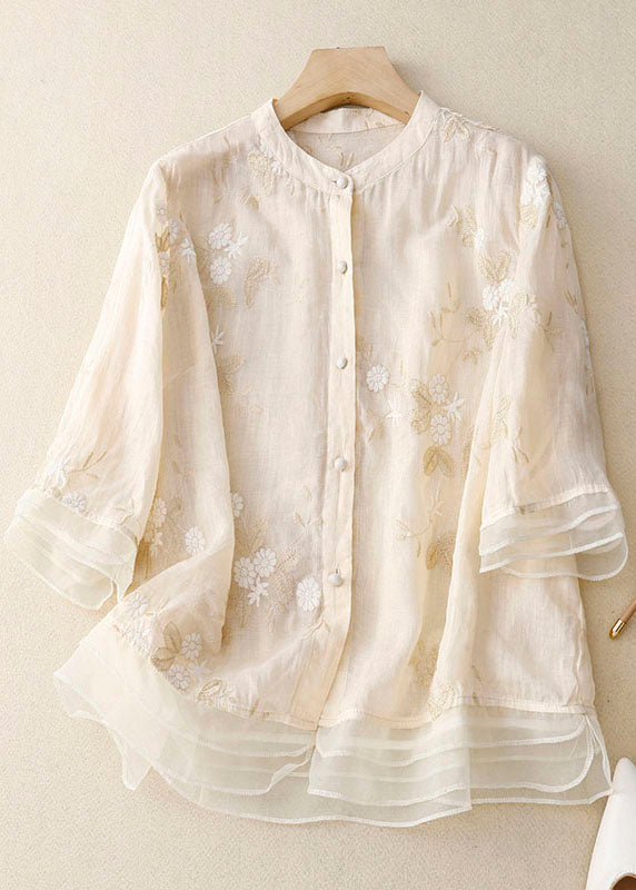 Elegant women's floral patchwork blouse, chic long-sleeve button-down top for stylish summer fashion.