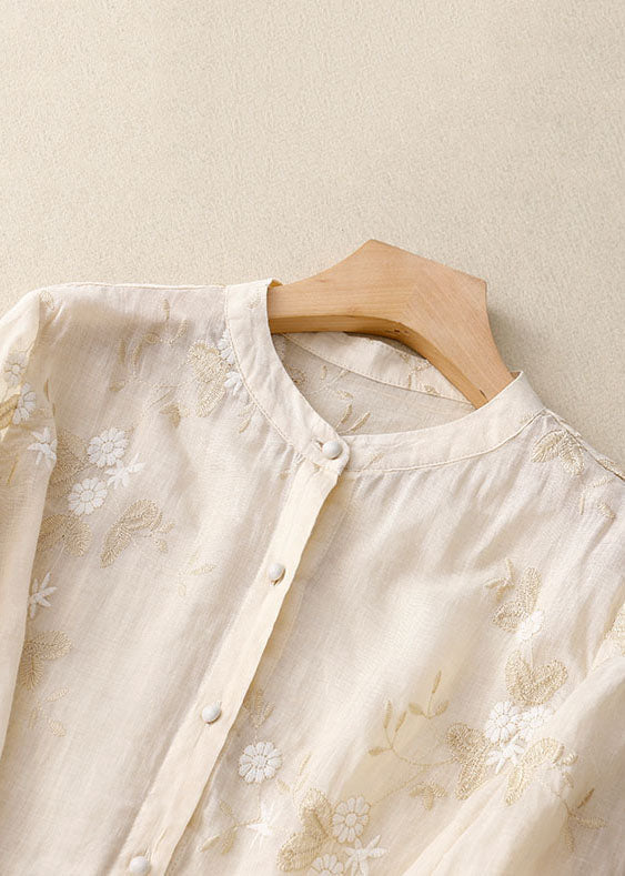 Comfortable women's floral button-up blouse, chic long-sleeve patchwork top, perfect for office and casual.