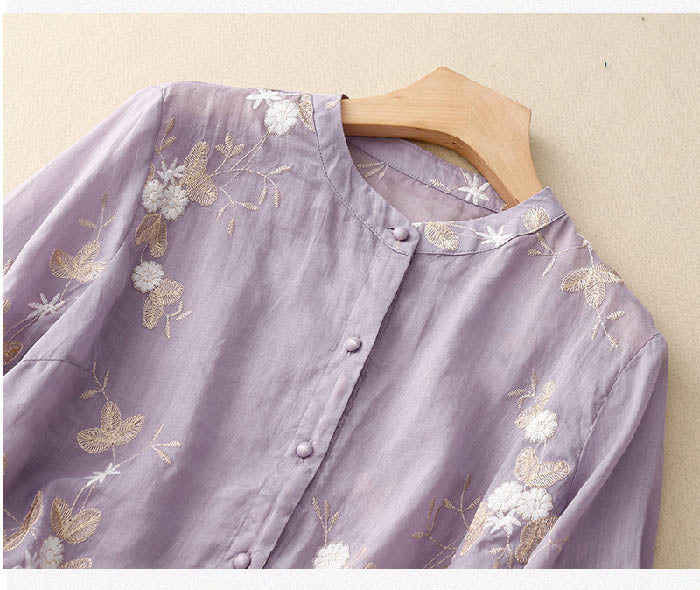 Stylish women's floral long-sleeve blouse, elegant button-down top with patchwork design, comfortable fashion.