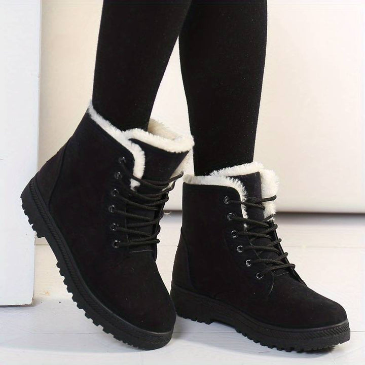 Women's chic insulated winter boots with anti-slip sole, perfect for ultimate warmth & comfort in cold weather & snow.