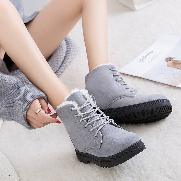 Cozy women's insulated snow boots for superior warmth & comfort. Durable anti-slip design ideal for winter cold.
