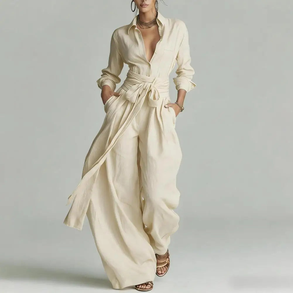 Women's chic ivory two-piece co-ord set with a button-down shirt and relaxed wide-leg pants, casual elegant.