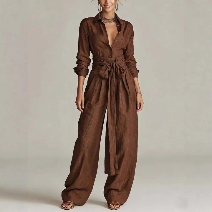 Black women's two-piece co-ord set with a relaxed-fit button-down shirt and flowy wide-leg pants for versatile wear.