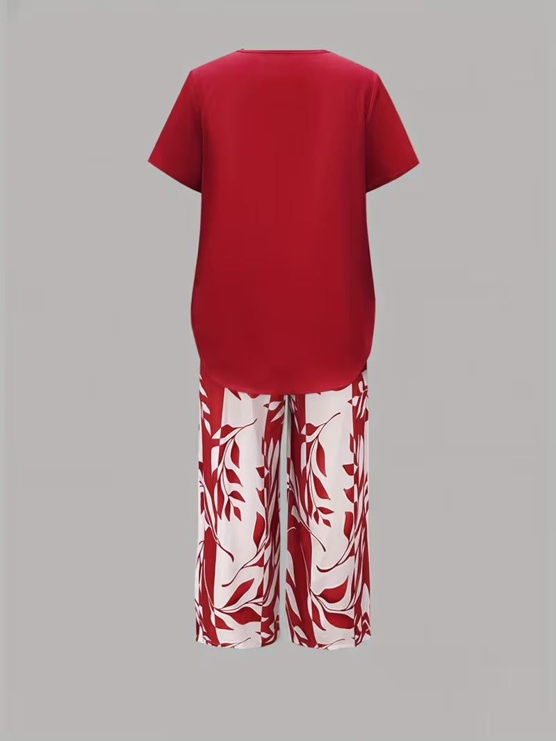 Women's chic leaf print two-piece outfit, perfect for spring/summer casual wear with a relaxed fit.