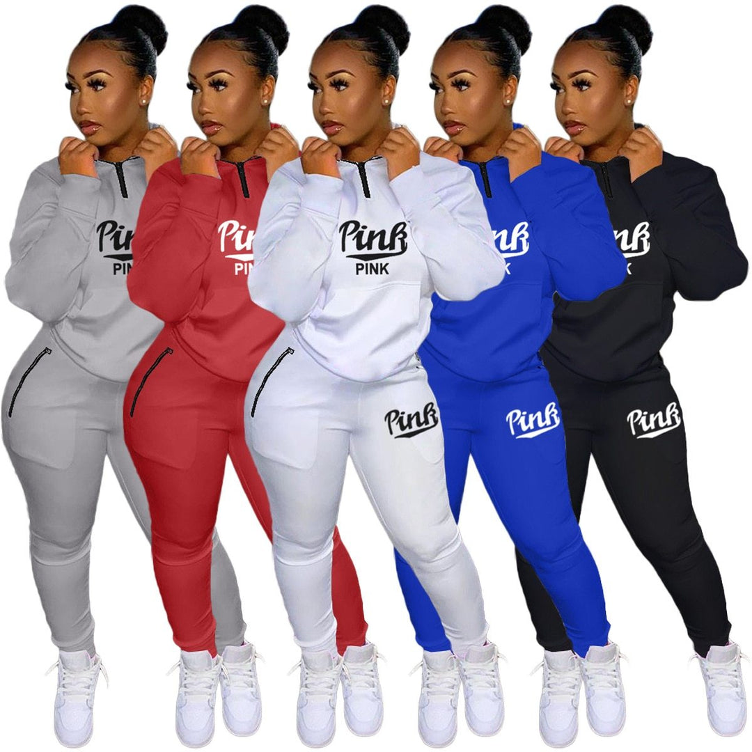 Women's chic letter print two-piece loungewear set. Comfortable & stylish matching jogger and pullover.