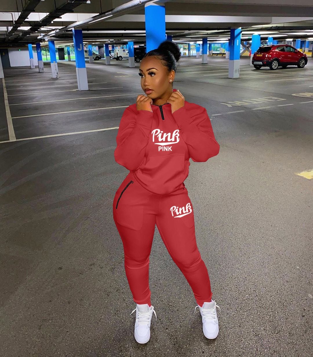 Women's letter print matching jogger set. Stylish two-piece loungewear for comfortable everyday fashion.