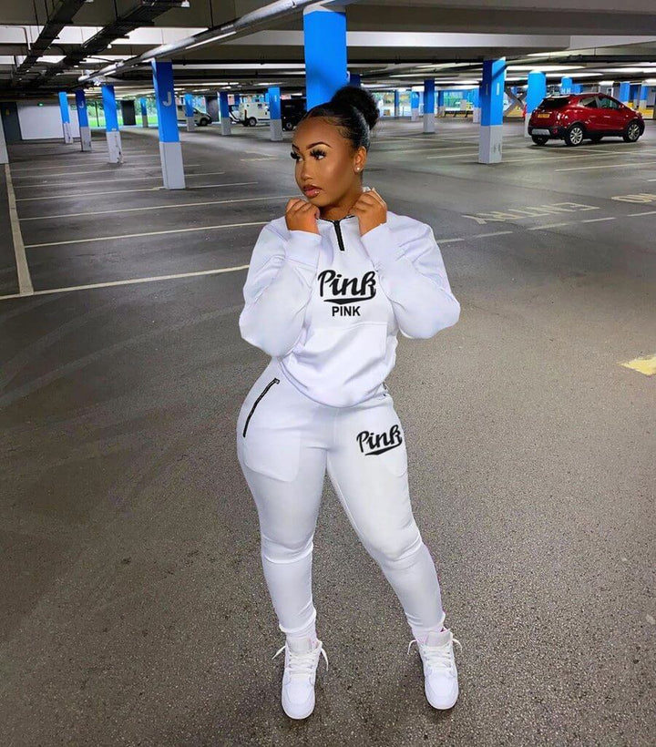 Soft women's letter print loungewear. Two-piece pullover and jogger set for cozy, chic athleisure.
