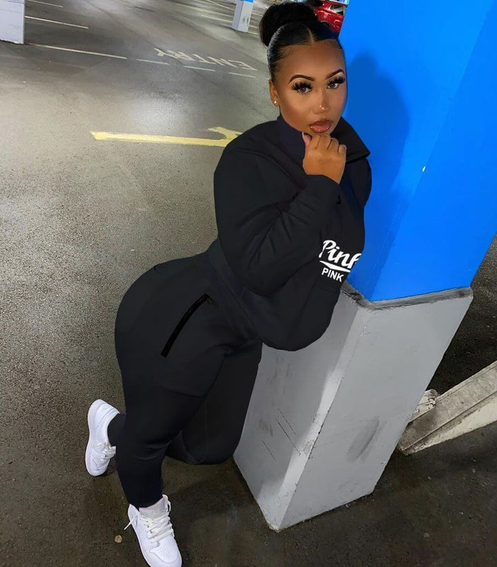 Women's letter print activewear set. Two-piece pullover & jogger for stylish comfort and athleisure.